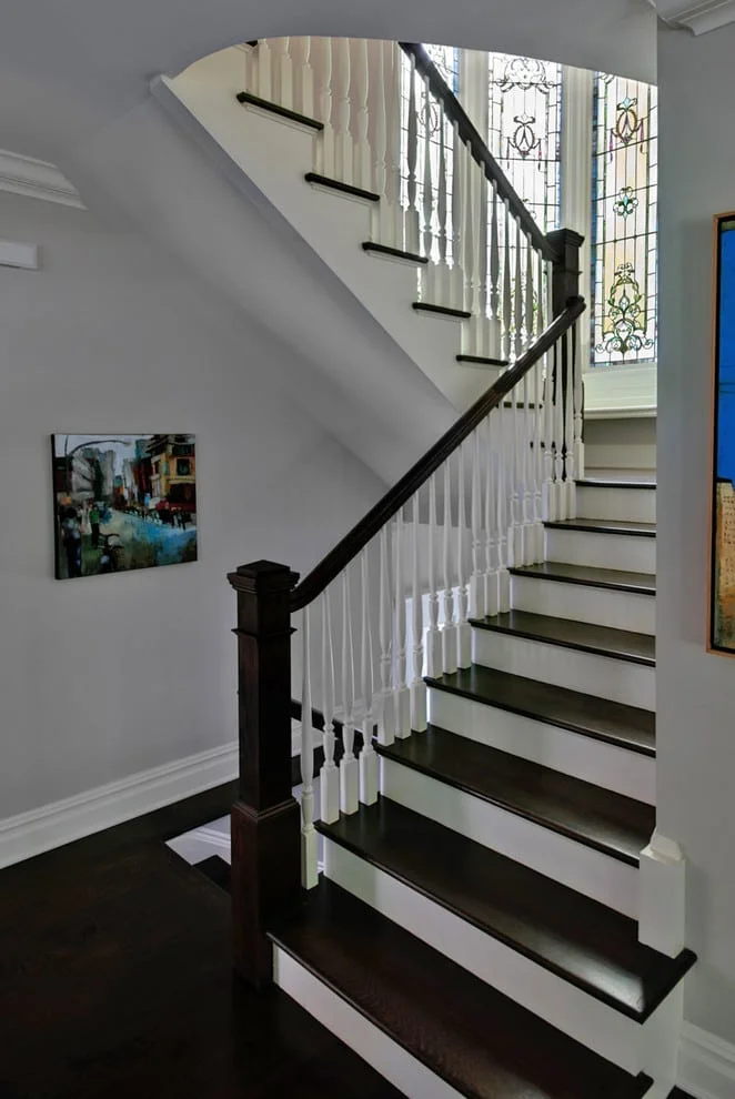 black and white hardwood flooring staircase